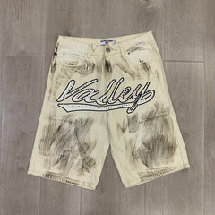 Vale Forever Splatter Paint Distressed Denim Shorts