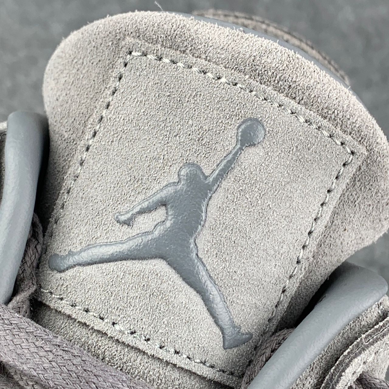 KAWS x Air Jordan 4 Retro 'Cool Grey' Sample